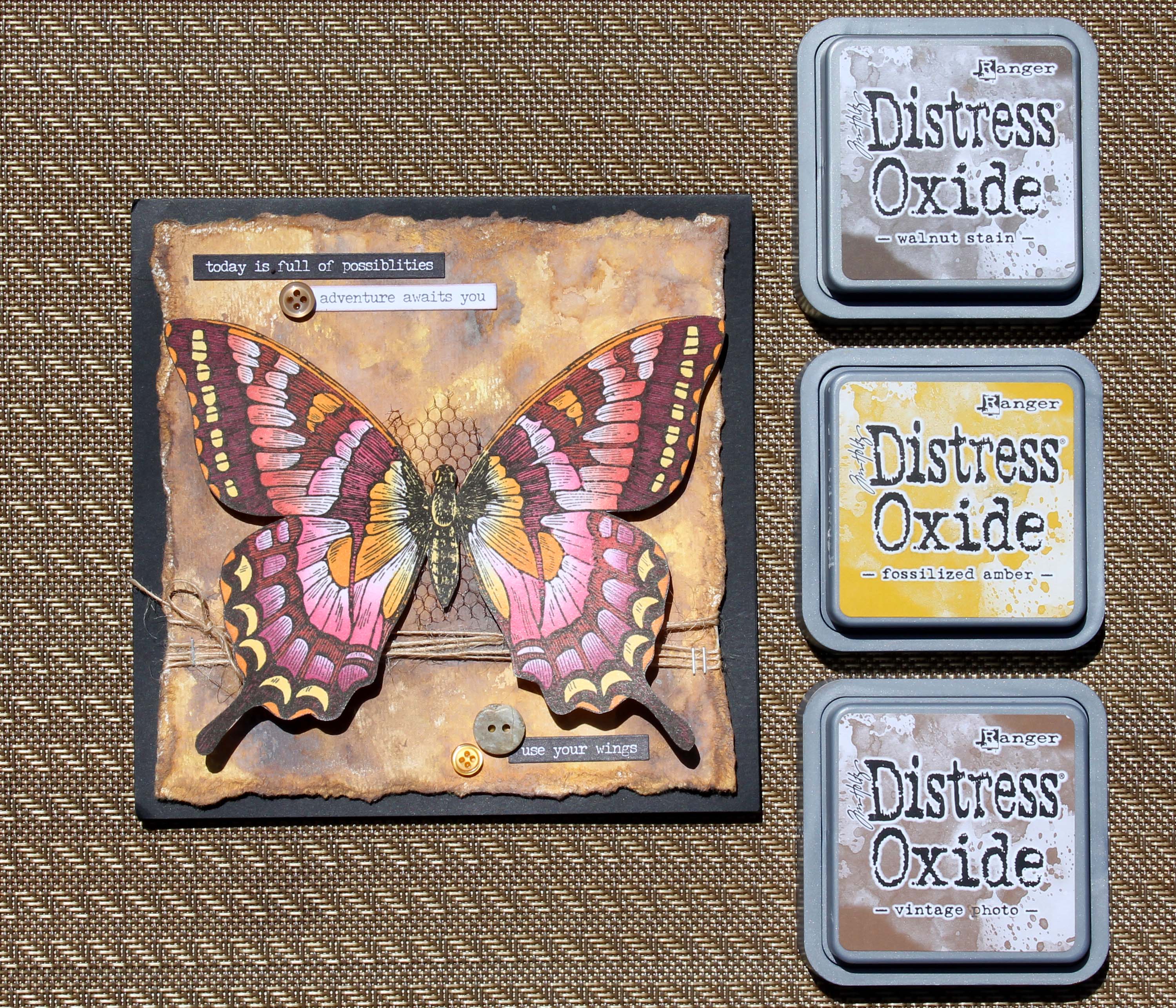 @csmscrapbooker Handmade butterfly card stamped with Ranger ink using a butterfly stamp from Stampin Up. Background created using Ranger Distress Oxide inks.