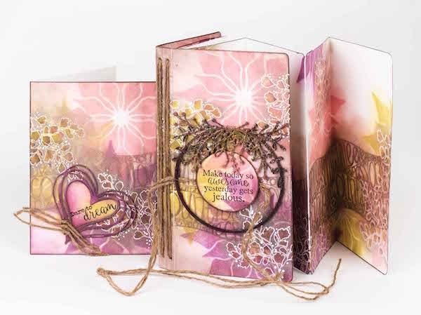 A scrapbook card and folio featuring Clearsnap with stamping and inking designed by Cathie Allan.