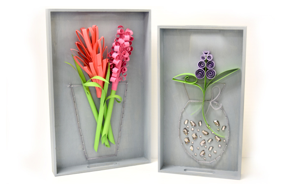 Paper flower art project of quilled like flowers in a shadow box.