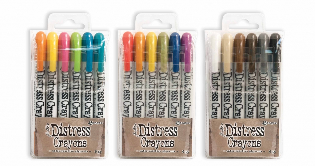 Three different sets of Ranger distress crayons by Tim Holtz