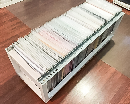 Vertical storage for 12x12 paper and supplies