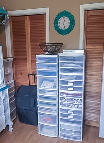 Where You Create / organized space / stacking drawers fit nicely between closets / teal clock