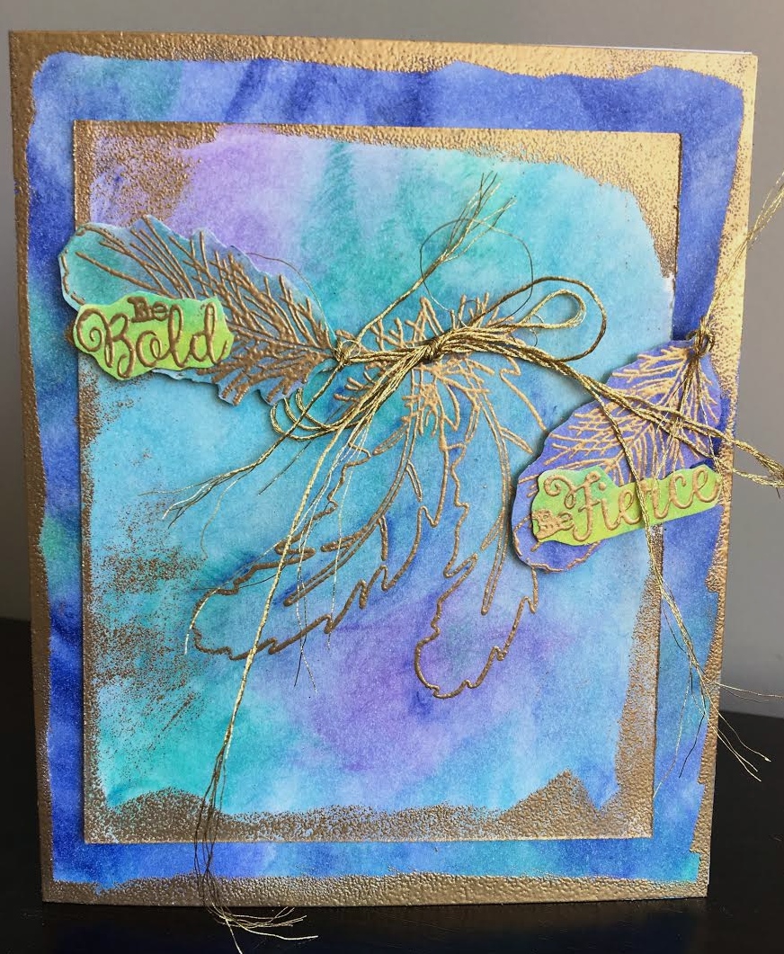 Scrapbook card featuring the Impression Obsession Elegant Feathers Stamp Set