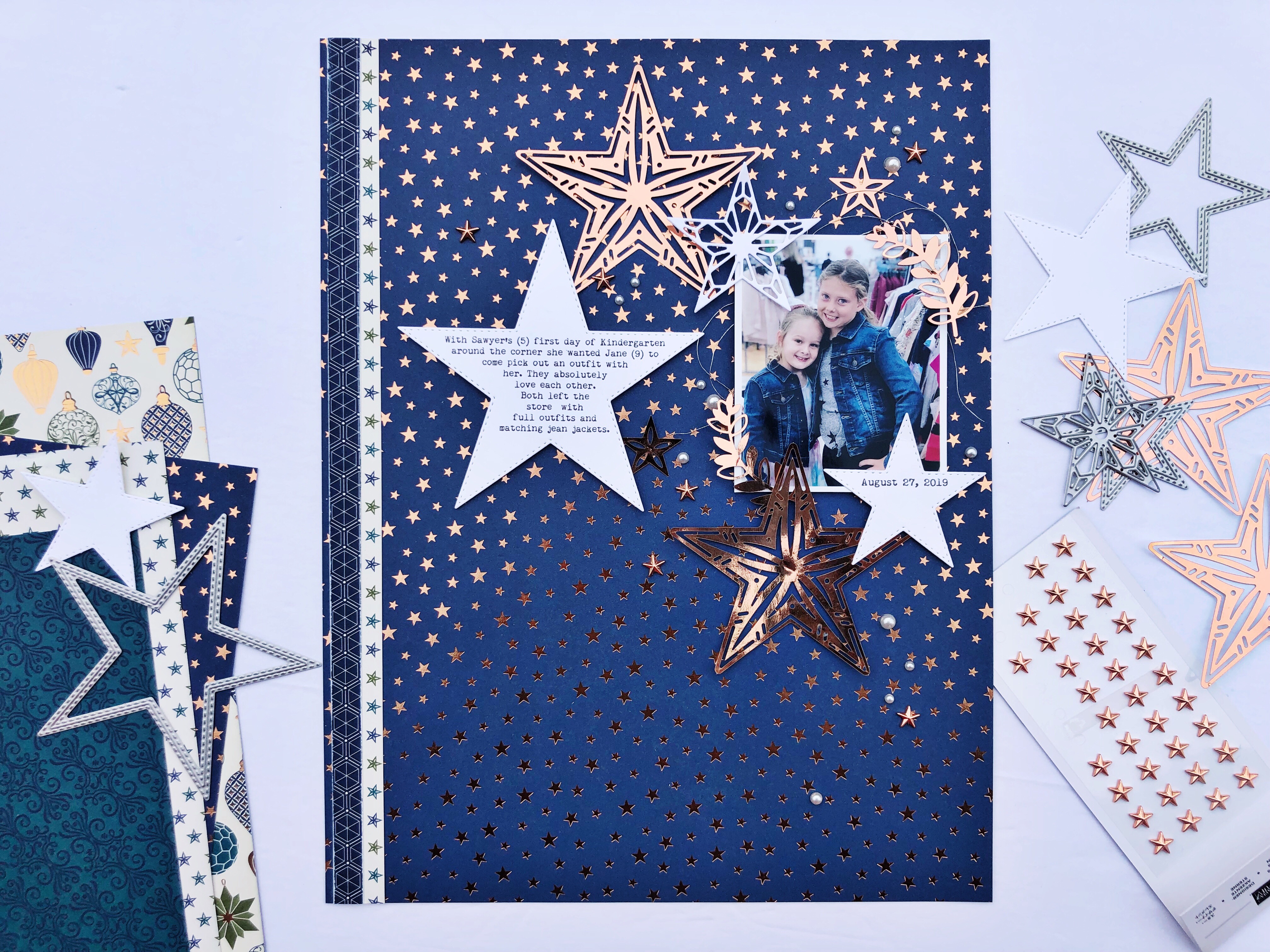 8 1/2 X 11 blue scrapbook layout with stars all over it. Layout featured the Stitched Stars Framelits by Stampin' Up!. Designed by Cathy Caines