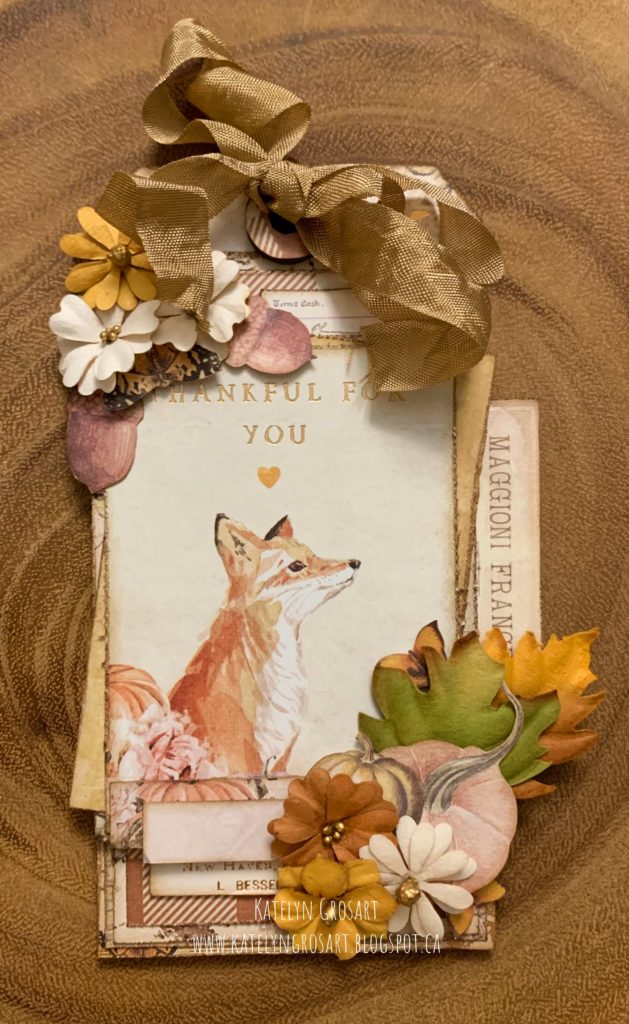 Vintage Thankful Tag for autumn scrapbooked with paper from Prima Marketing Autumn Sunset Collection with a happy fox on the front. Designed by Katelyn Grosart