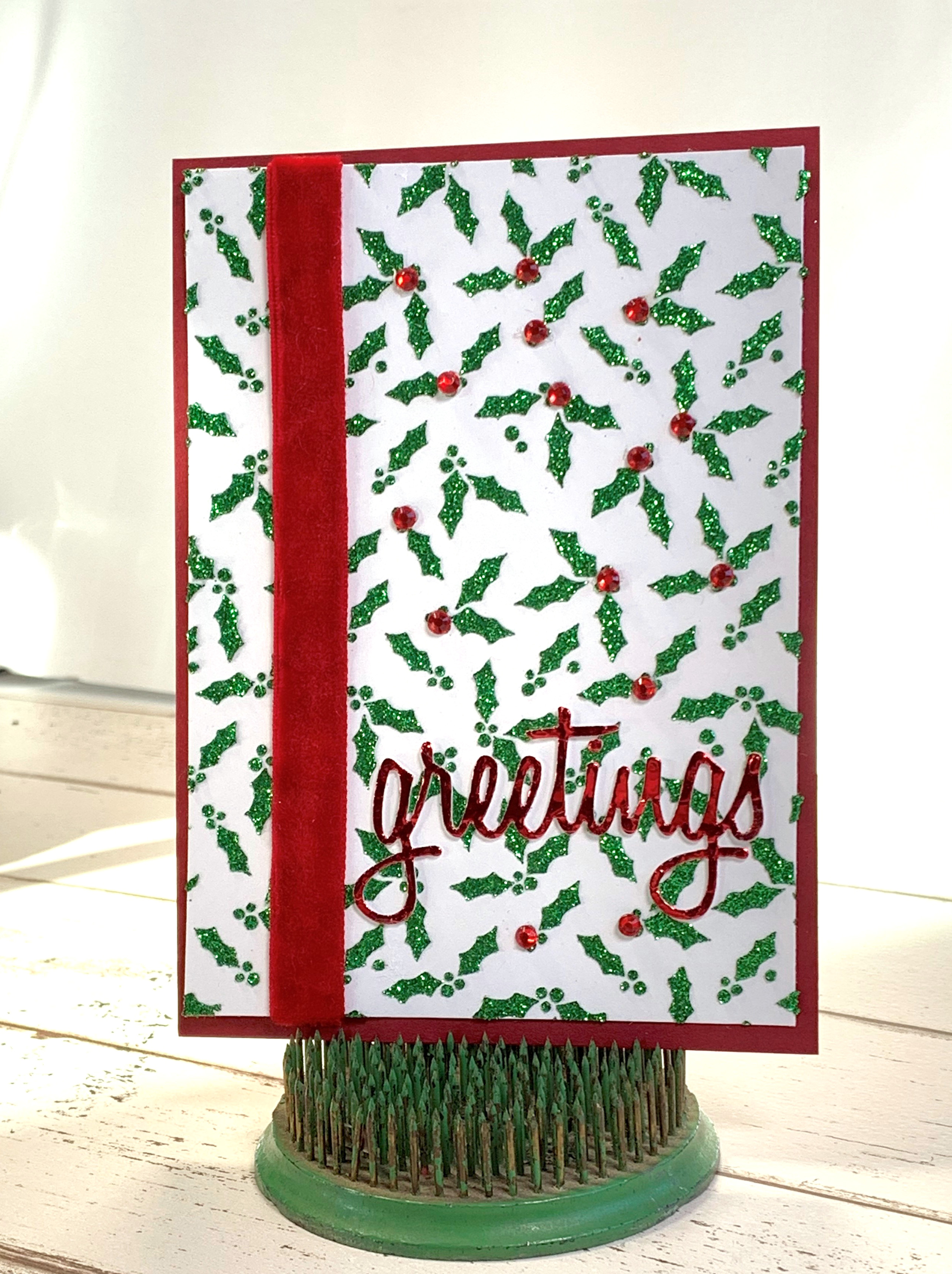 Christmas card designed by Kerry Engel featuring Green Glitz Glitter Gel by Therm O Web and a Carta Bella Holly stencil