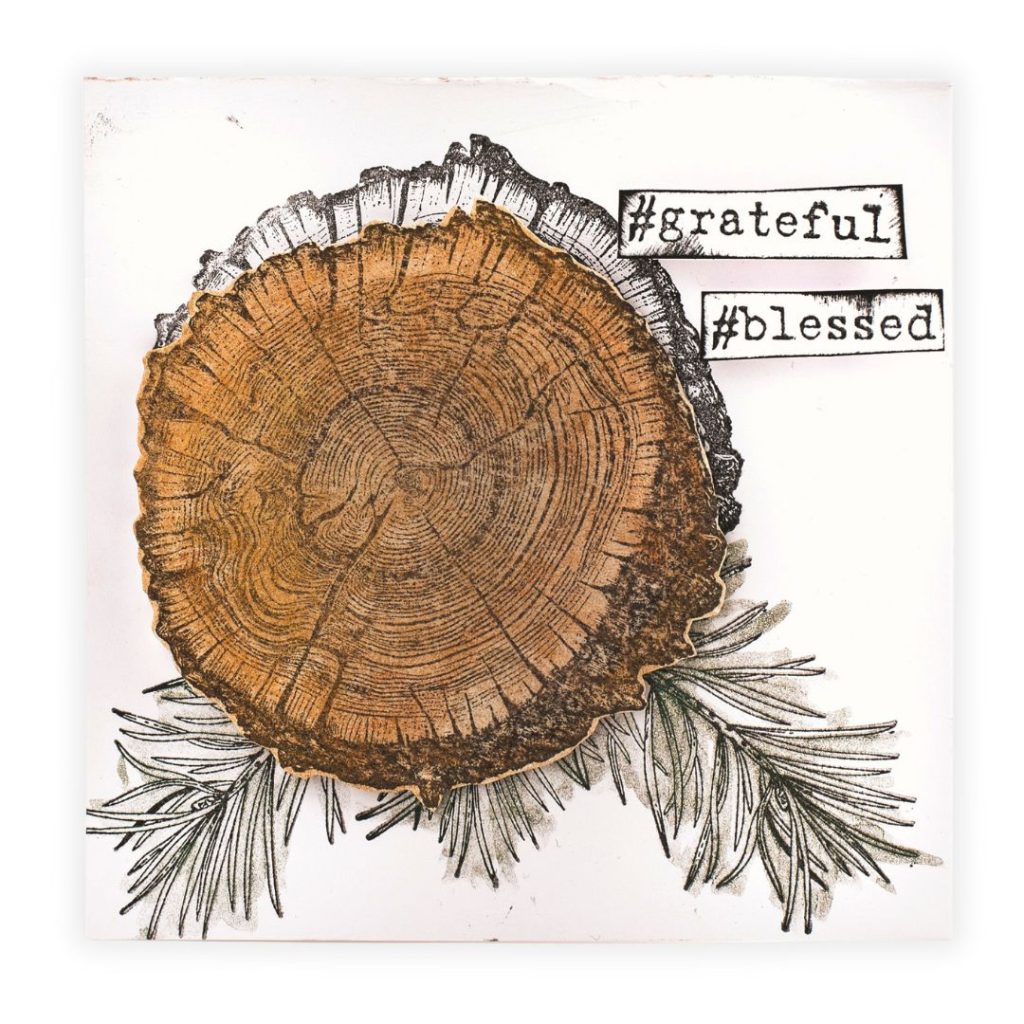 Completed wood slice card with watercoloured slice, stamped greenery, and layered sentiments.