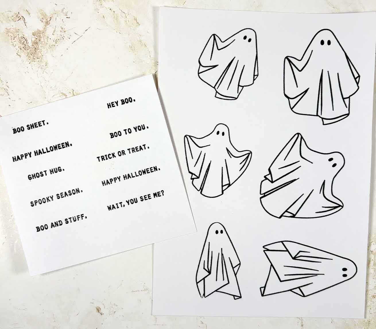 Step 2 of Spooky Treat Tags project by Heather Fischer showing stamped ghost images and Halloween sentiments from the Stampers Anonymous Spooky Spirits CMS492 stamp set on white cardstock, ready to cut out.