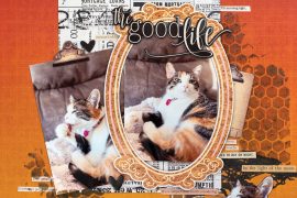 The Good Life scrapbook layout by Desiree Saskiw featuring a cozy cat design with layered papers, textured honeycomb stenciling, and warm autumn tones.